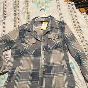 Women’s size medium plaid, Shackett brand is members mark new with tag.